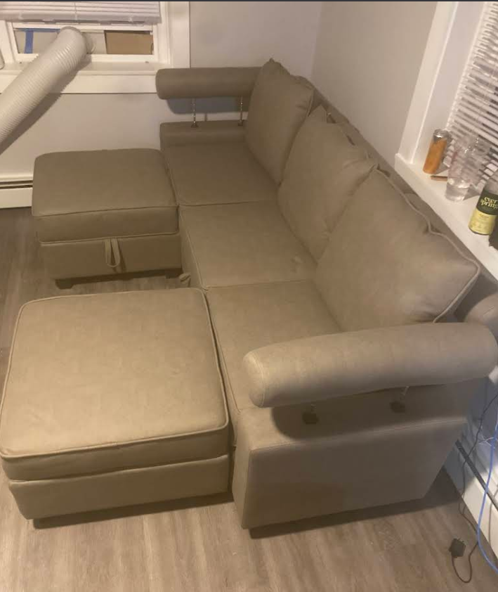 Beige sectional sofa fully assembled in living space